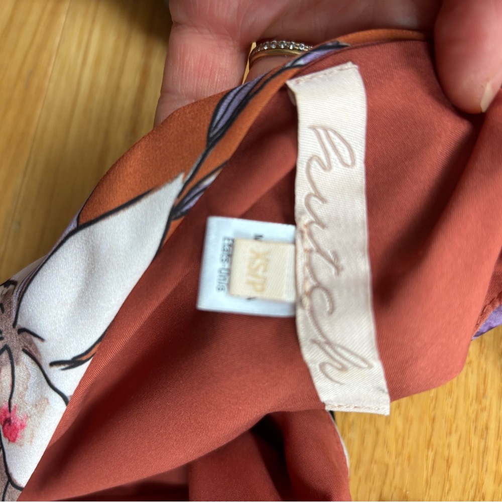 Rust Orange dress from Anthropologie with floral design